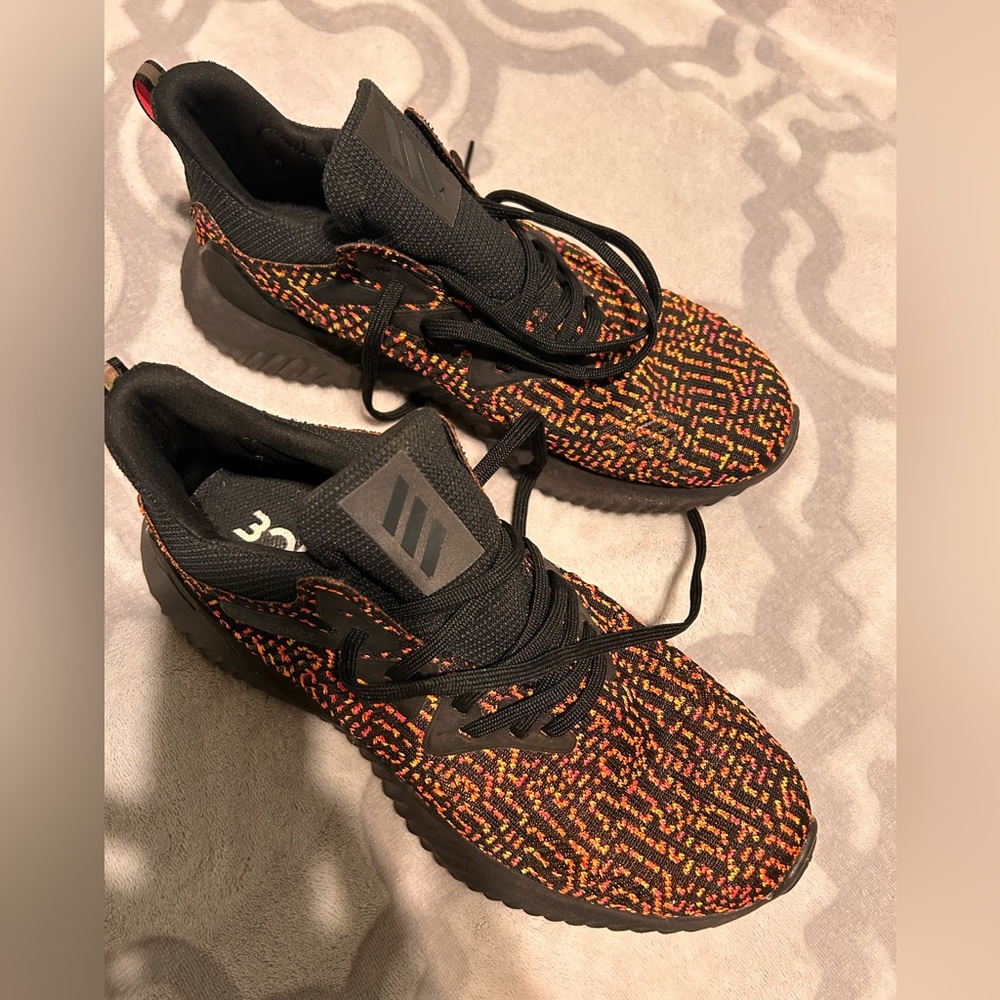 Adidas tennis shoes. New worn once